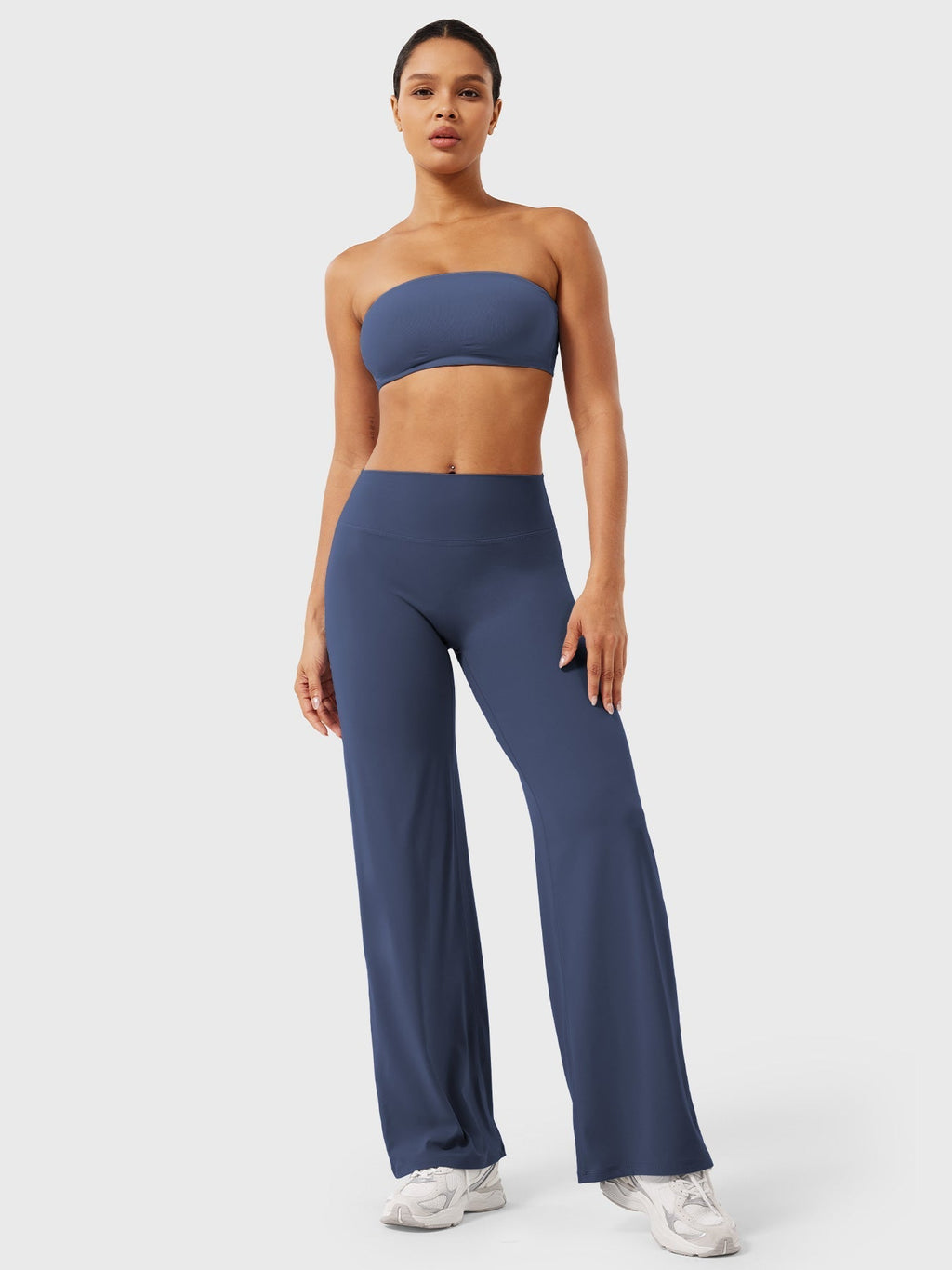 Navy blue high waist flared pants for women by Jesie-London, featuring a summer-ready, stylish fit.