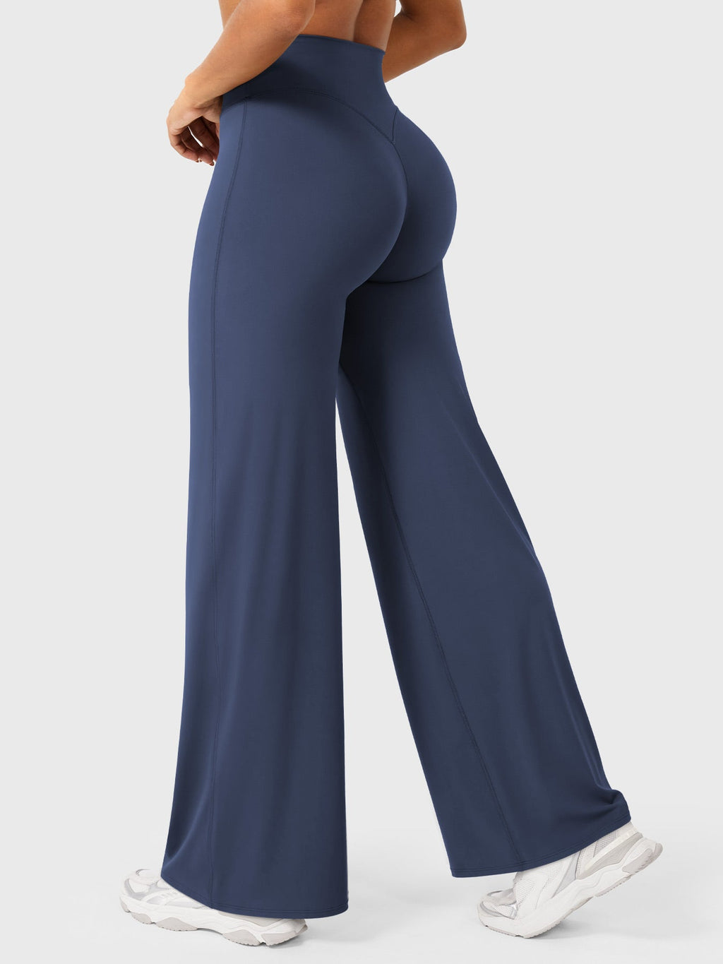 Navy blue high waist flared summer pants for women by Jesie-London, featuring a fitted waist and flowing wide-leg design.