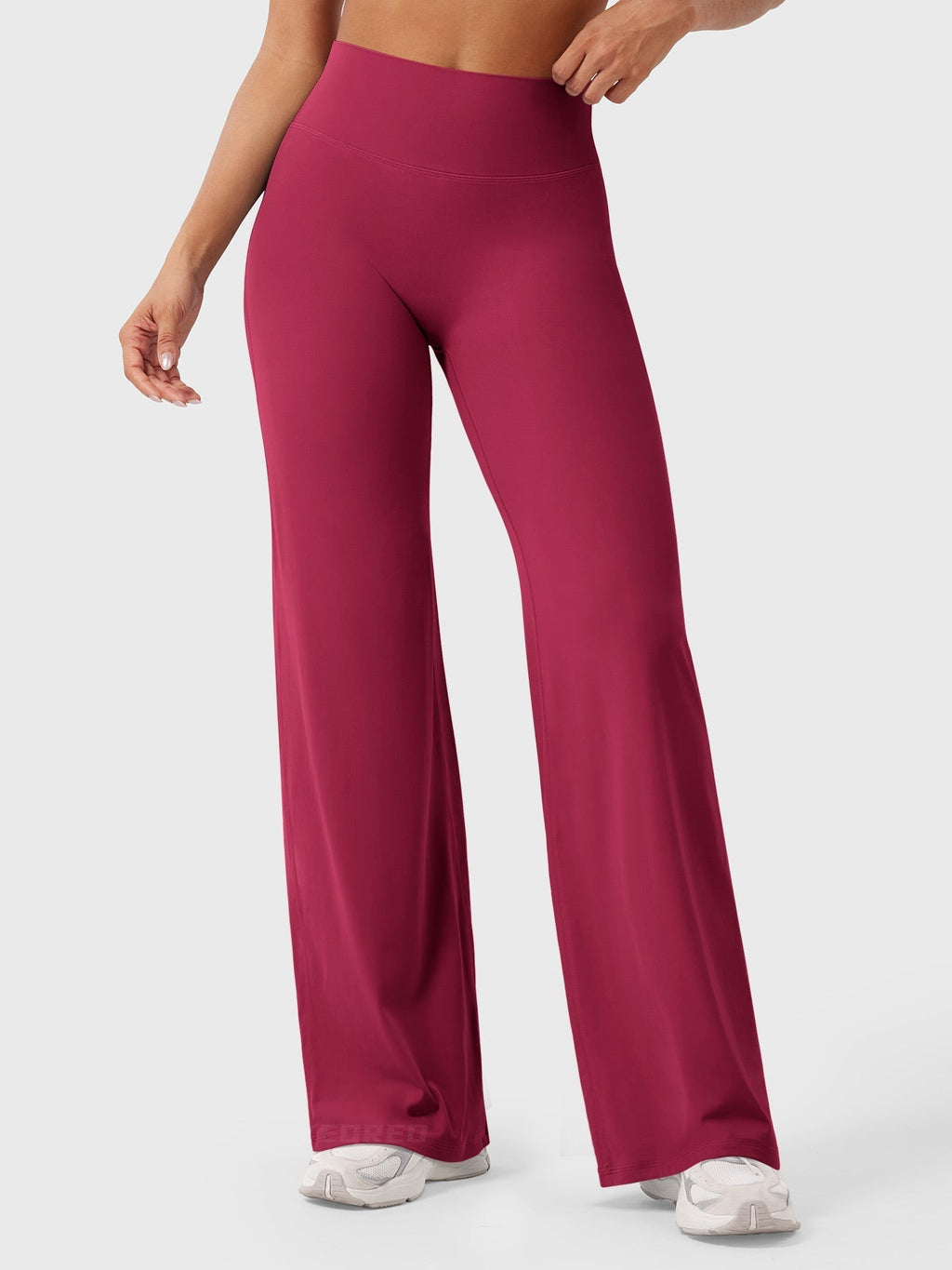 Ruby red women's high waist flared pants from Jesie-London's Millie summer collection, featuring a stylish and comfortable fit.