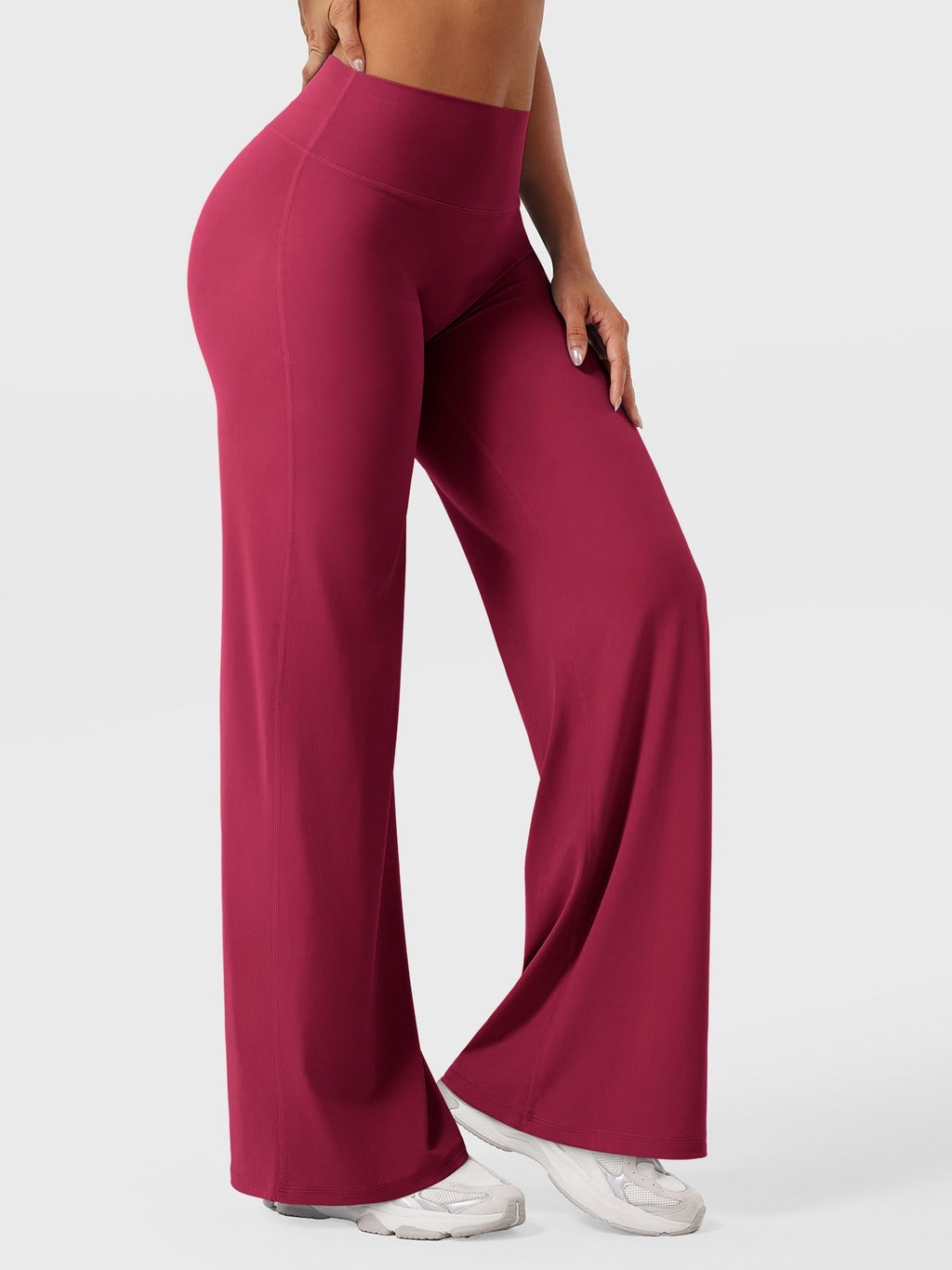 Millie women's high waist flared summer pants in vibrant ruby red by Jesie-London, shown styled for warm weather wear.