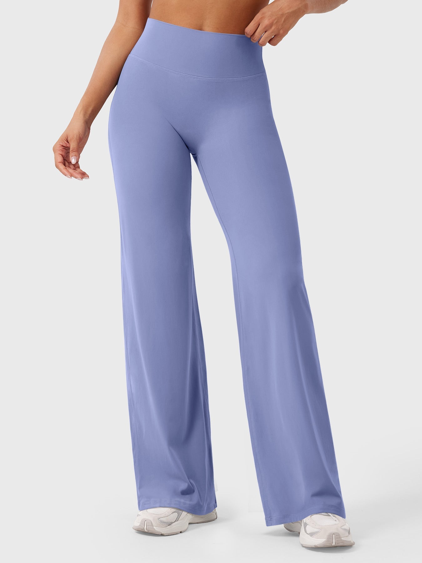Sea blue high waist flared pants for women by Jesie-London, featuring a summer-ready style and relaxed fit in the image.