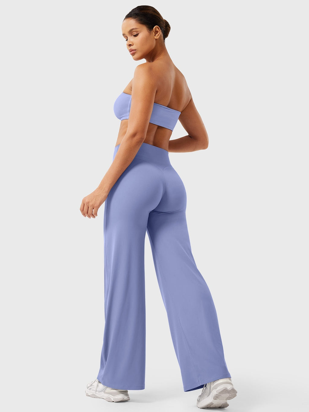 Sea blue women's high waist flared pants from Jesie-London's Millie summer collection, featuring a stylish and comfortable fit.