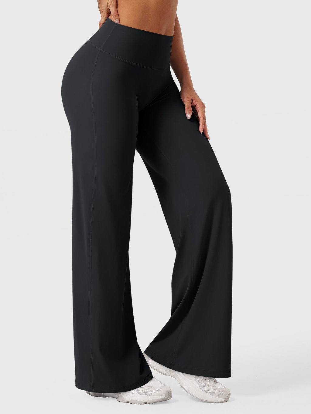 Black women’s high waist flared pants from Jesie-London, featuring a summer-friendly fit and flared leg design.